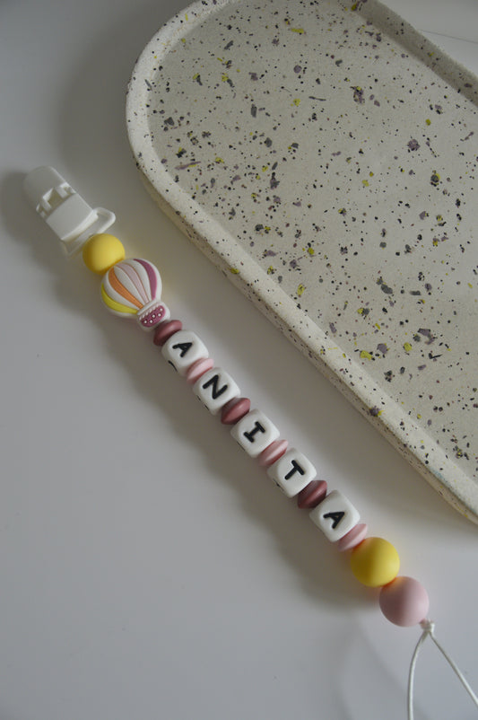 Prendedor de chupeta balão de ar