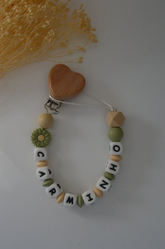 Prendedor de chupeta flor