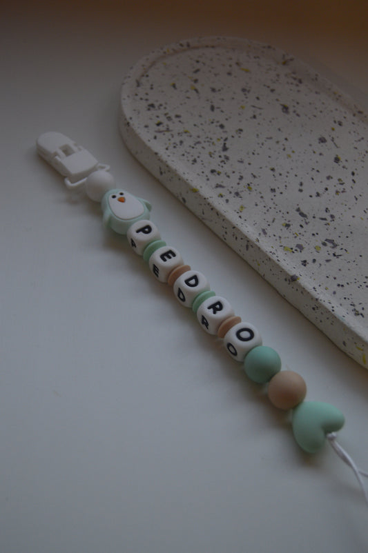 Prendedor de chupeta Pinguim