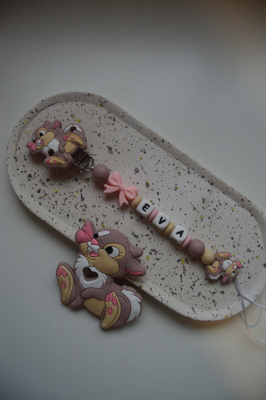 Conjunto prendedor e mordedor Tambor