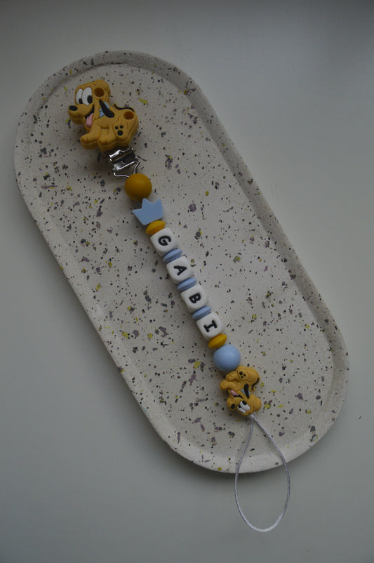 Prendedor de chupeta Pluto